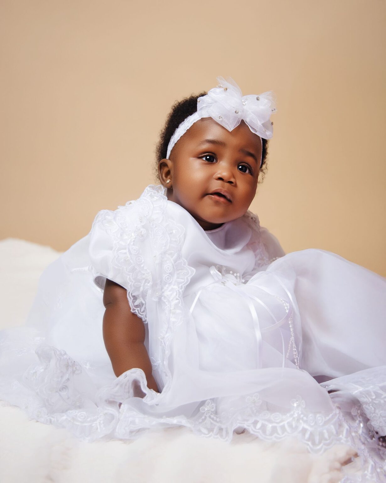 Baby in a christening gown