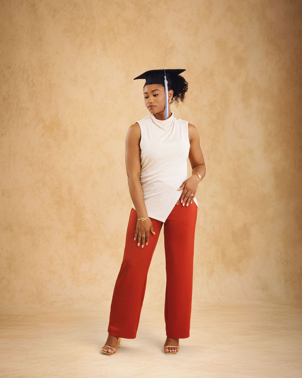 Graduate standing in cap